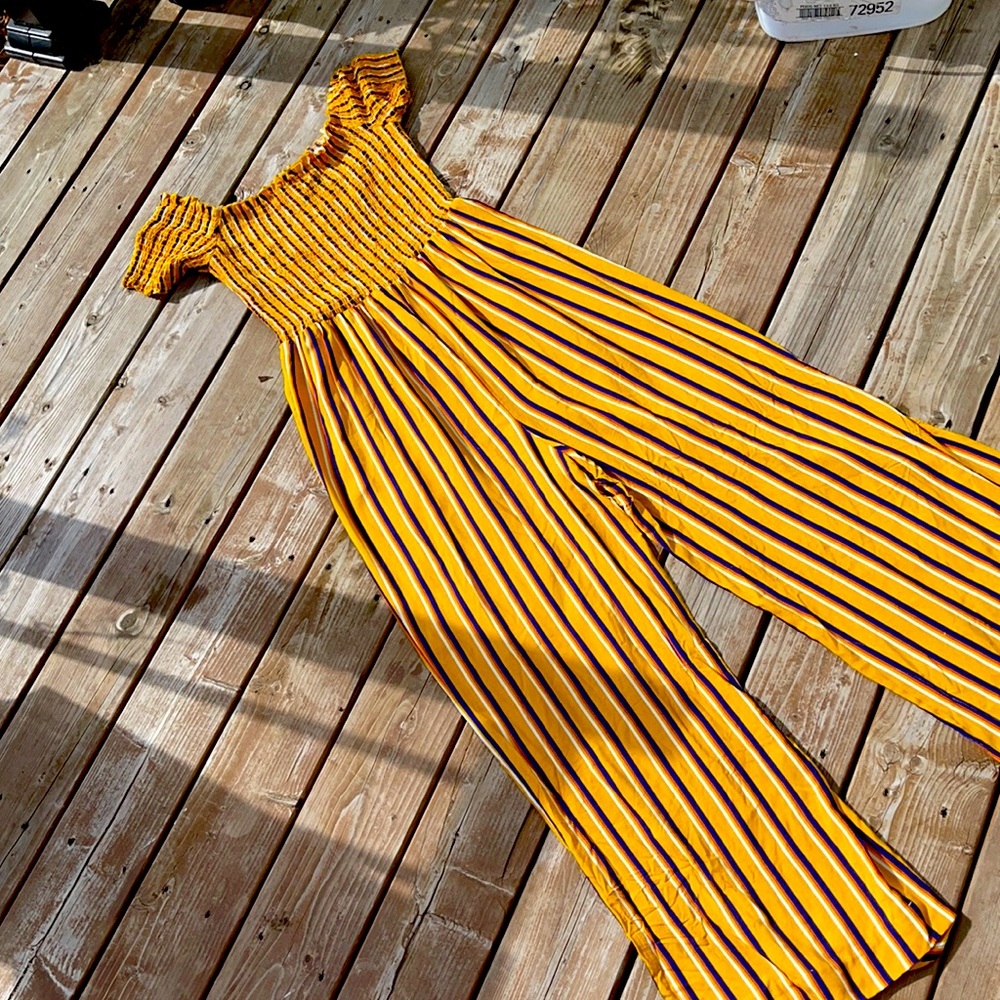 Large mustard fàll jumpsuit from Laura